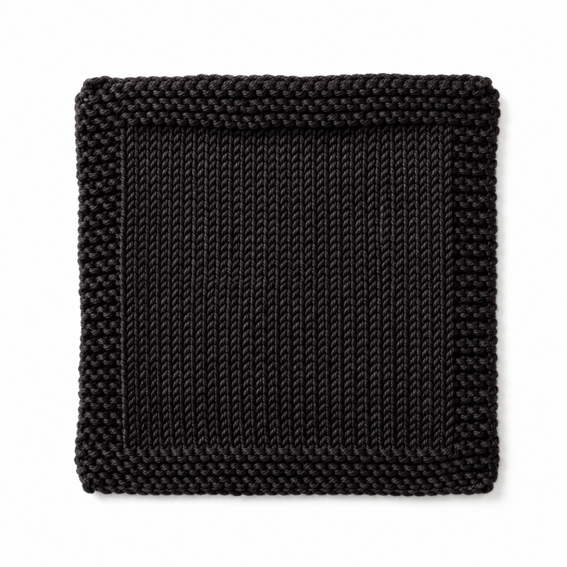 Negro intenso 135 (merino fingering) — muestra tejida